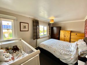 Bedroom One- click for photo gallery